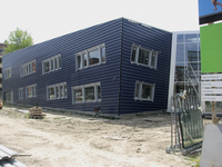 905343 Gezicht op het zuidelijk gedeelte van de experimentele nieuwbouw van het Utrechts Stedelijk Gymnasium aan de Ina ...